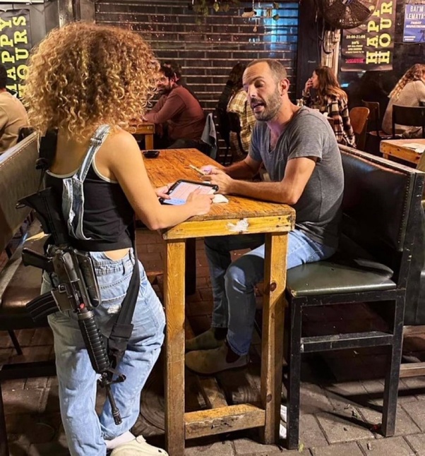 Armed Israeli waitress