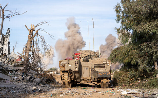 Israeli tank and explosion in Gaza IDF photo