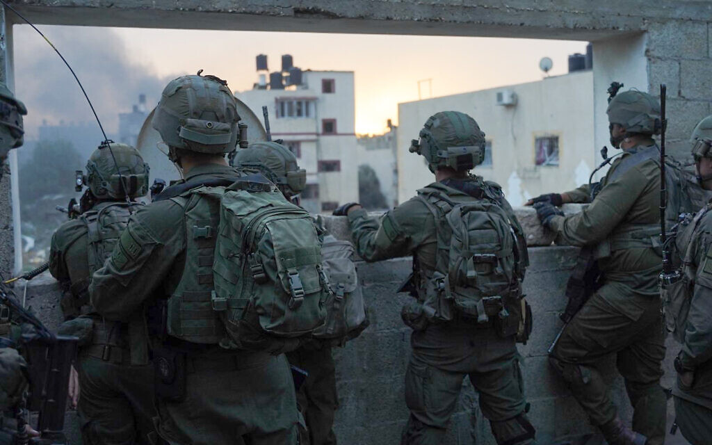 Israeli troops looking out window IDF photo