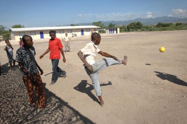 Haiti children play soccer DoD photo