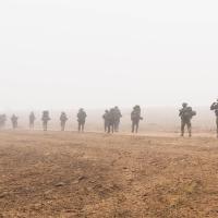 Israeli troops march in single file in fog in Gaza IDF photo
