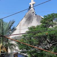 Holy family church gaza burned
