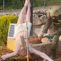 IDF soldier destroys a crucifix in Lebanon screen capture