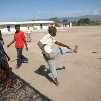 Haiti children play soccer DoD photo