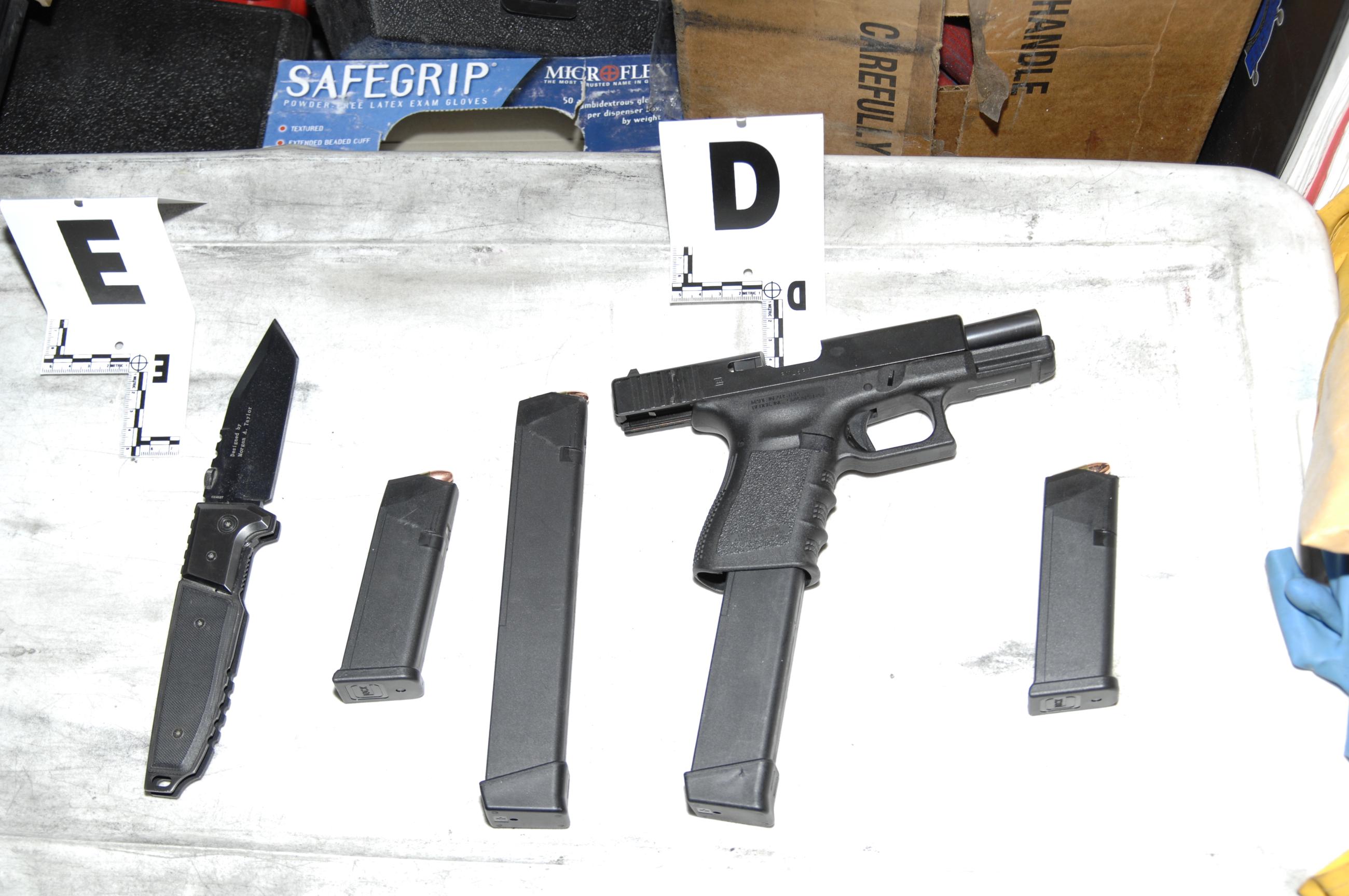 Confiscated weapons 2011 Tucson shooting FBI photo Wikimedia