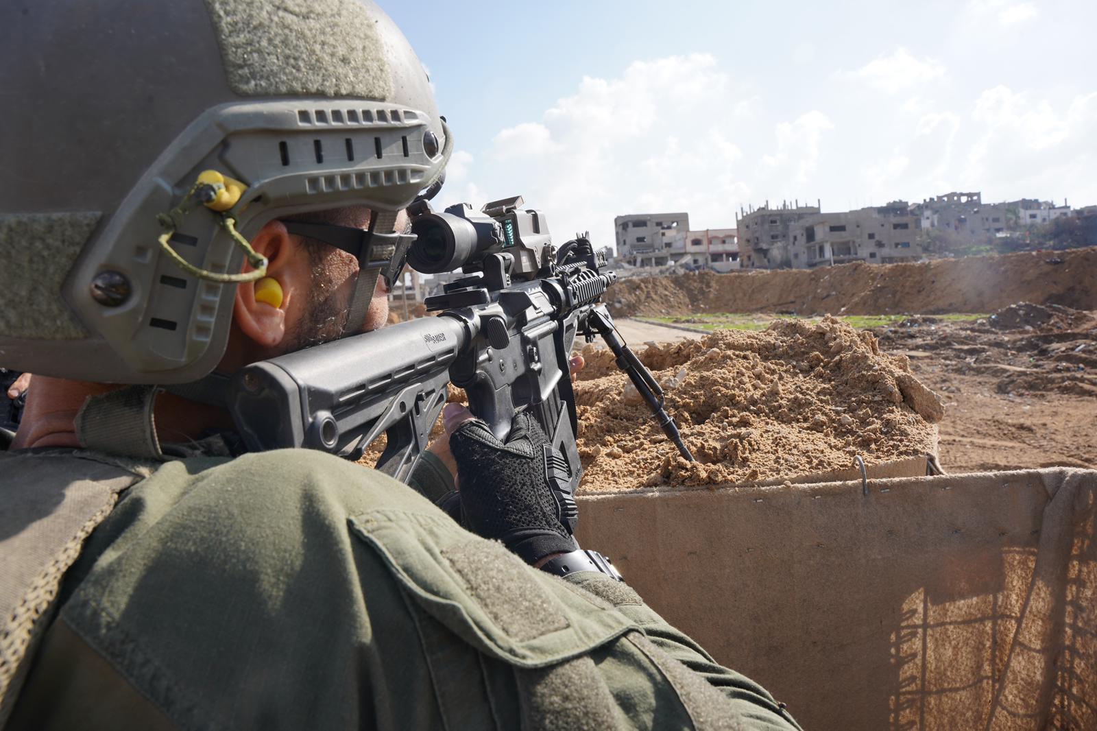 IDF soldier aiming rifle in Gaza IDF photo